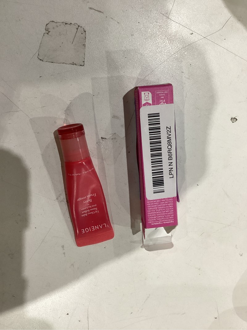 Condition photo showing As Is for laneige lip glowy balm: sheer tinted lip moisturizer with shea butter, for hydrating shine & soft lips sweet candy