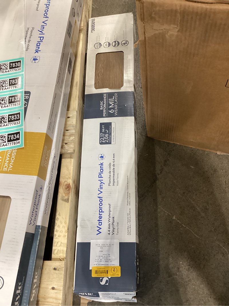 Condition photo showing Good Condition for  style selections tawny oak 6-mil x 6-in w x 36-in l waterproof luxury vinyl plank flooring