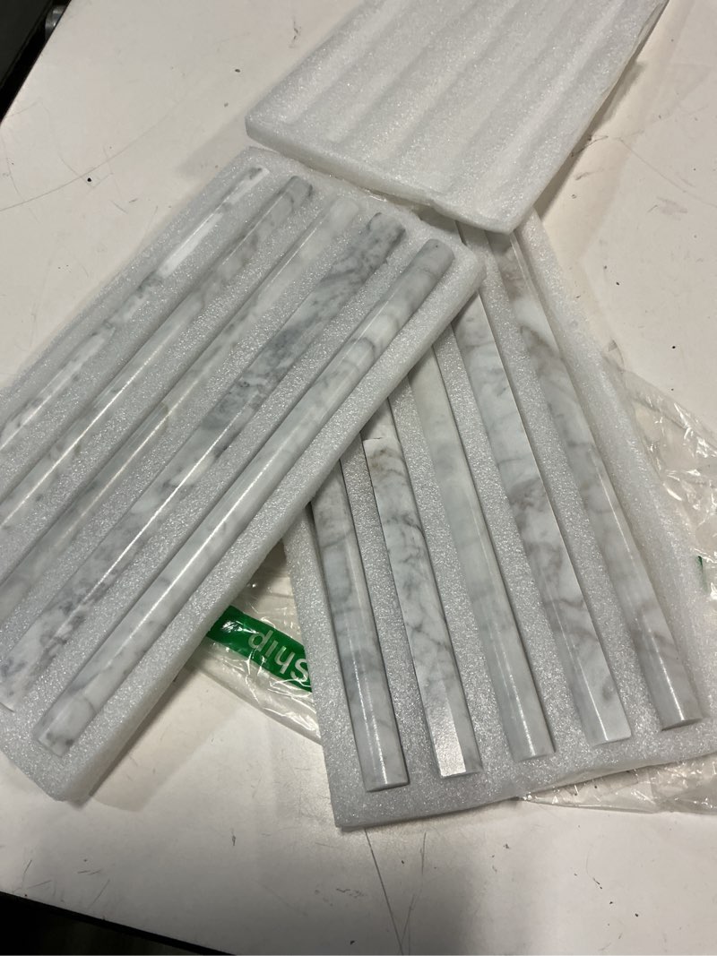 Condition photo showing Good Condition for 10-pack carrara white marble pencil liner tile, 3/4" x 12" honed natural stone bullnose tile edge trim molding for kitchen backsplash, bathroom and shower wall