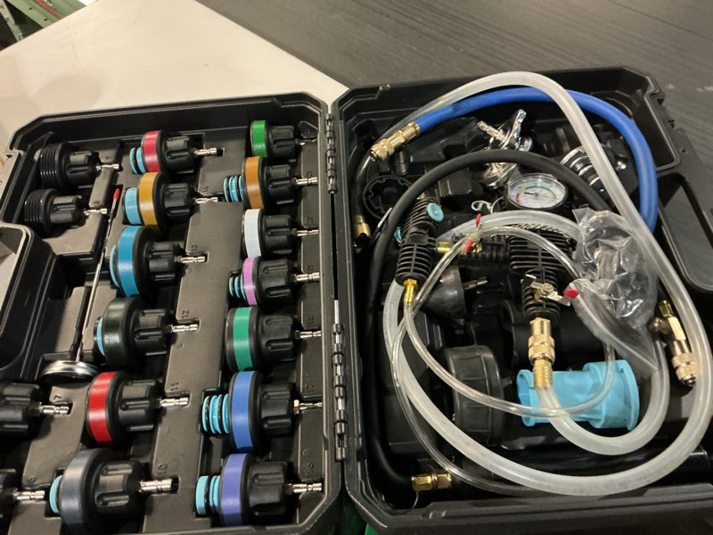 Condition photo showing Good Condition for 28pcs universal radiator pressure tester kit, tester pneumatic vacuum cooling system purge refill leak/refiller set, universal automotive domestic/import vehicles, motorcycle