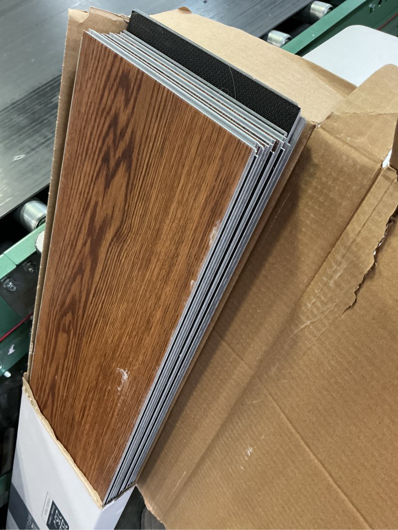 Condition photo showing Good Condition for Style Selections Brexley Oak 12-mil x 7-in W x 48-in L Waterproof Luxury