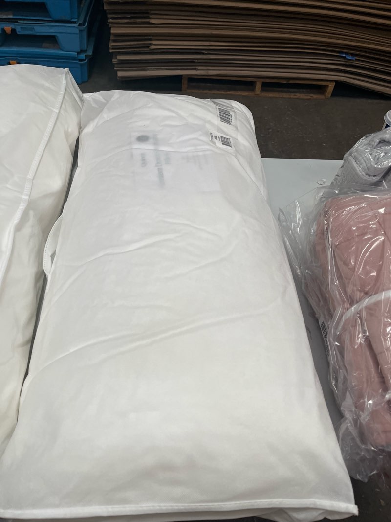 Condition photo showing New/Like New for premium down alternative pillow, king, soft/medium