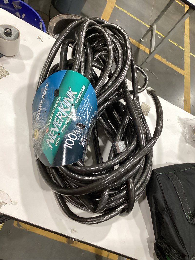 Condition photo showing Good Condition for neverkink teknor apex 5/8-in x 100-ft heavy-duty kink free vinyl gray coiled hose
