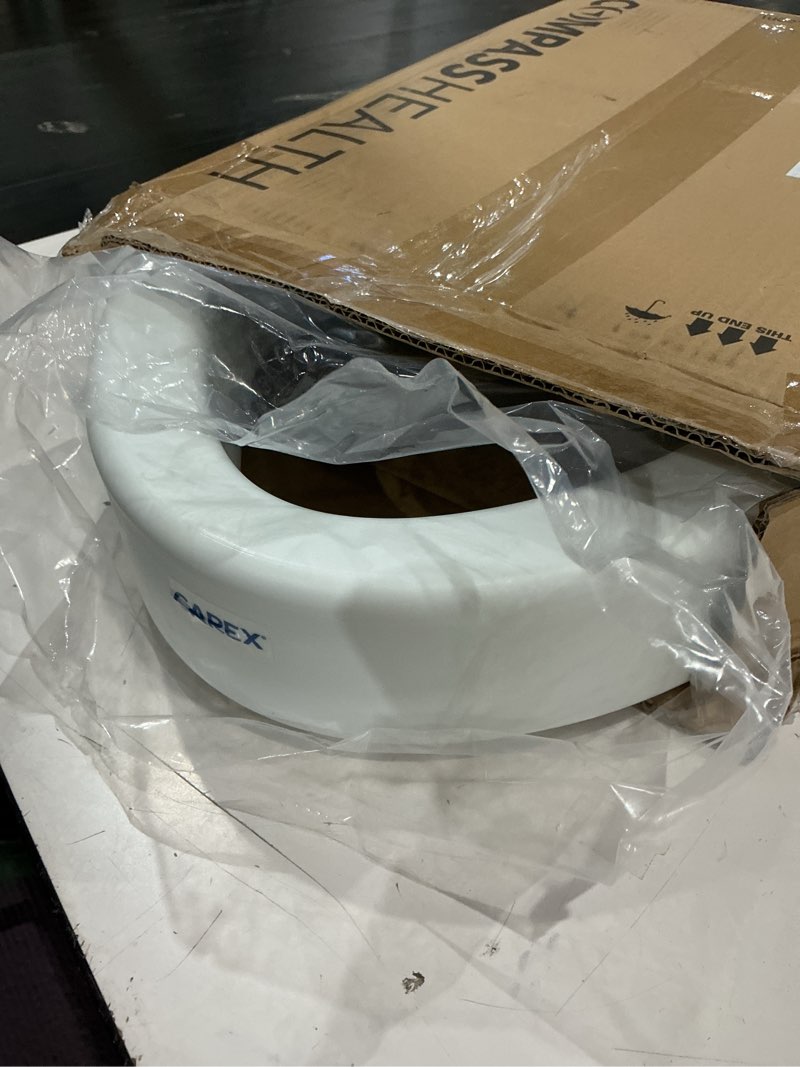 Condition photo showing As Is for carex elongated hinged toilet seat riser, adds 3.5 inches of height to toilet, 300 pound weight capacity, raised toilet seat