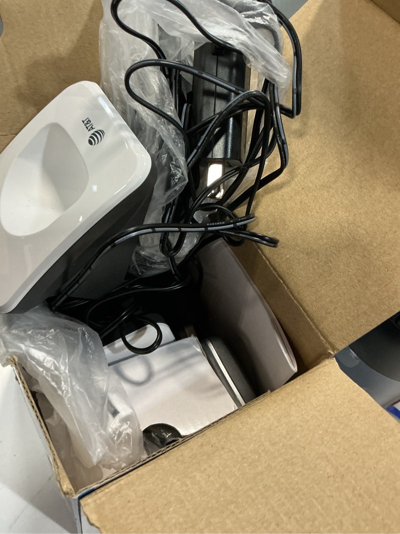 Condition photo showing Good Condition for at&t el52319 expandable cordless phone with unsurpassed range, answering system and caller id, 3 handsets, white/silver