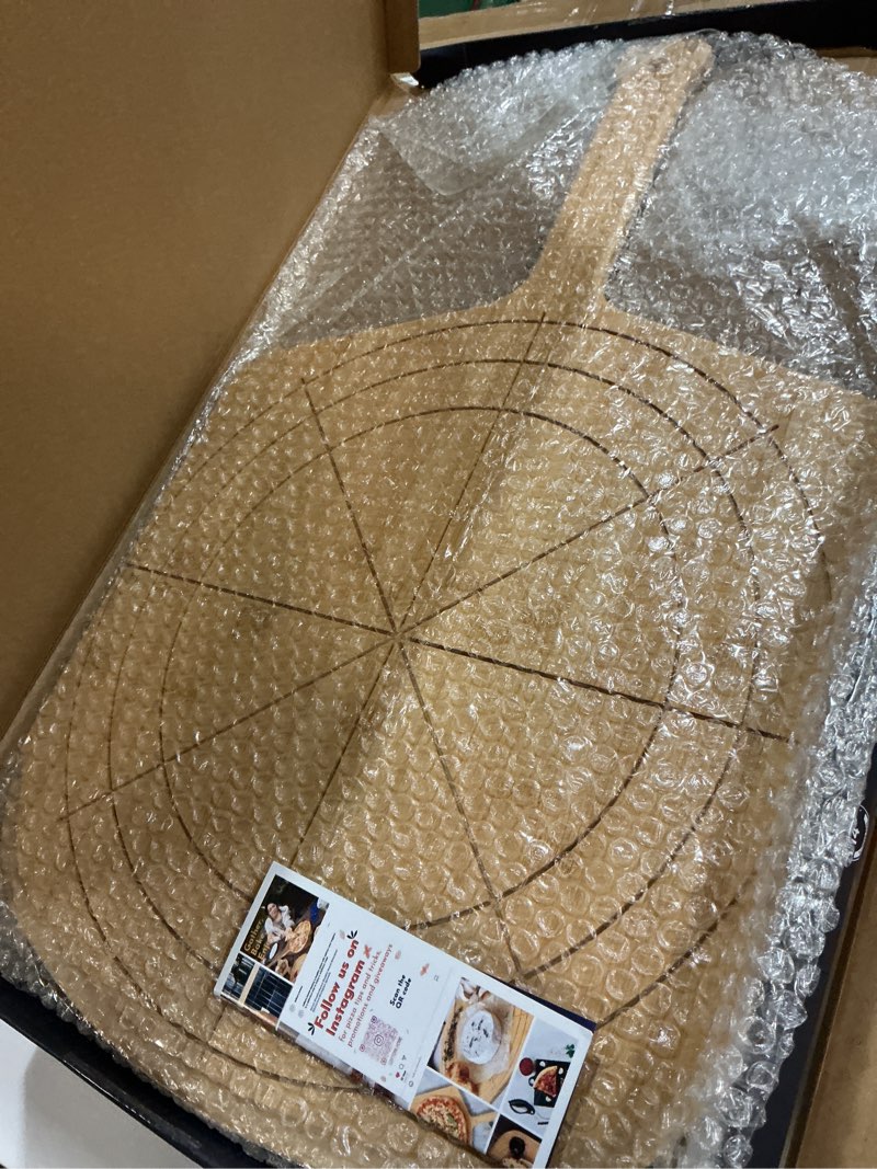 Condition photo showing Good Condition for Loftern Wooden Pizza Peel 14 Inch Board with Engraved Sizes - Multi-Purpose Bamboo Pizza Cutting Board, Wood Pizza Peel, Pizza Spatula Paddle, and Serving Board with Size and Cutting Guide Natural(14 inch)