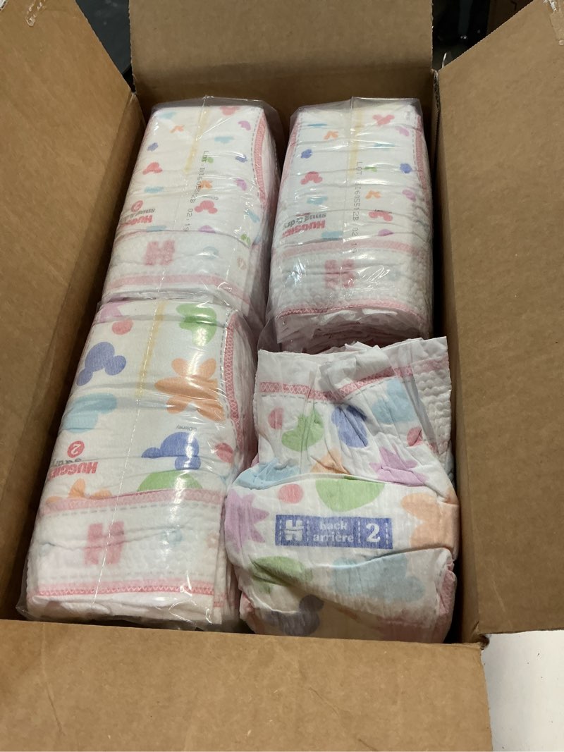 Condition photo showing As Is for huggies size 2 diapers, snug & dry baby diapers, size 2 (12-18 lbs), 116 count, packaging may vary size 2 116