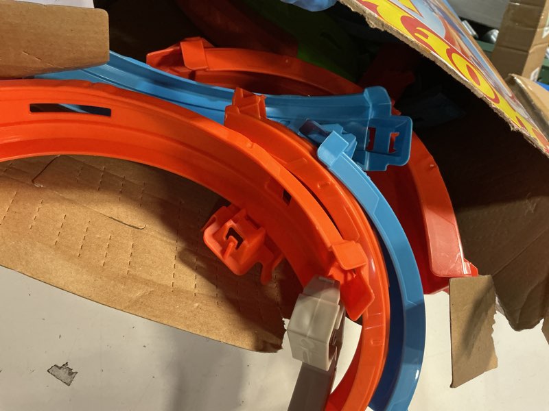 Condition photo showing As Is for hot wheels toy car track set, stunt track mid-air crash with 1:64 scale die-cast toy car, motorized booster for non-stop stunting & racing playset
