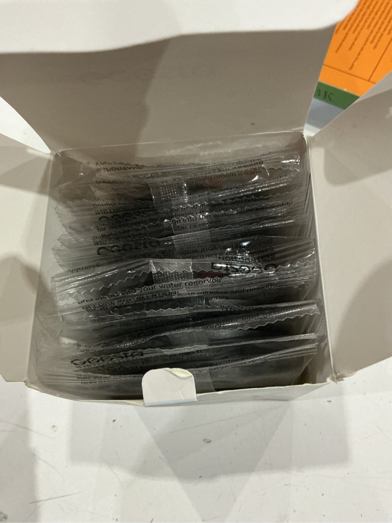 Condition photo showing As Is for 12-pack premium activated charcoal water filter disk for all mr. coffee models