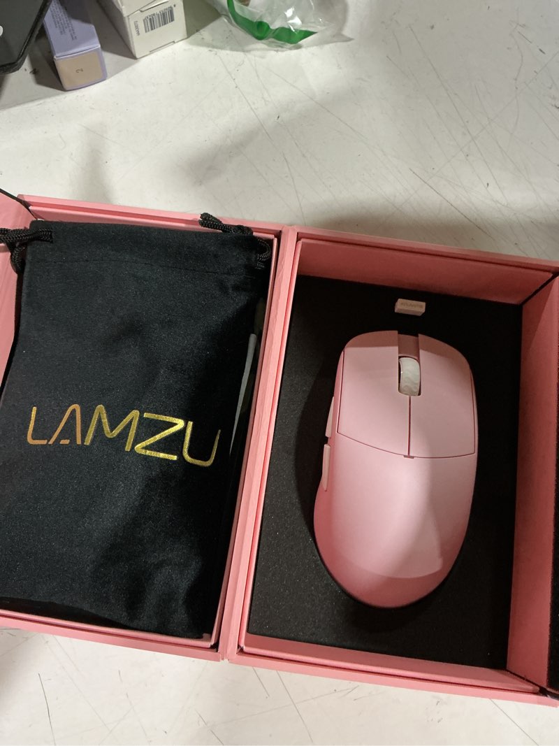 Condition photo showing As Is for lamzu atlantis mini champion edition wireless gaming mouse, ultra lightweight 51g, optical switch,30000 dpi, symmetrical, mcu nordic 52840, dust-proof encoder, paw3950 sensor, 8k compatible light pink