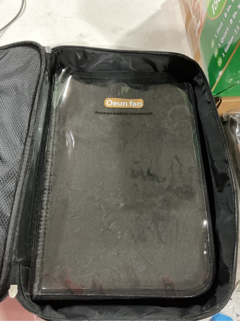 Condition photo showing Good Condition for oeun fan enamel pin display storage bag with shoulder strap, 12-page pro pins book to carry, display and trade your collectible pins, medals, brooches carbon black