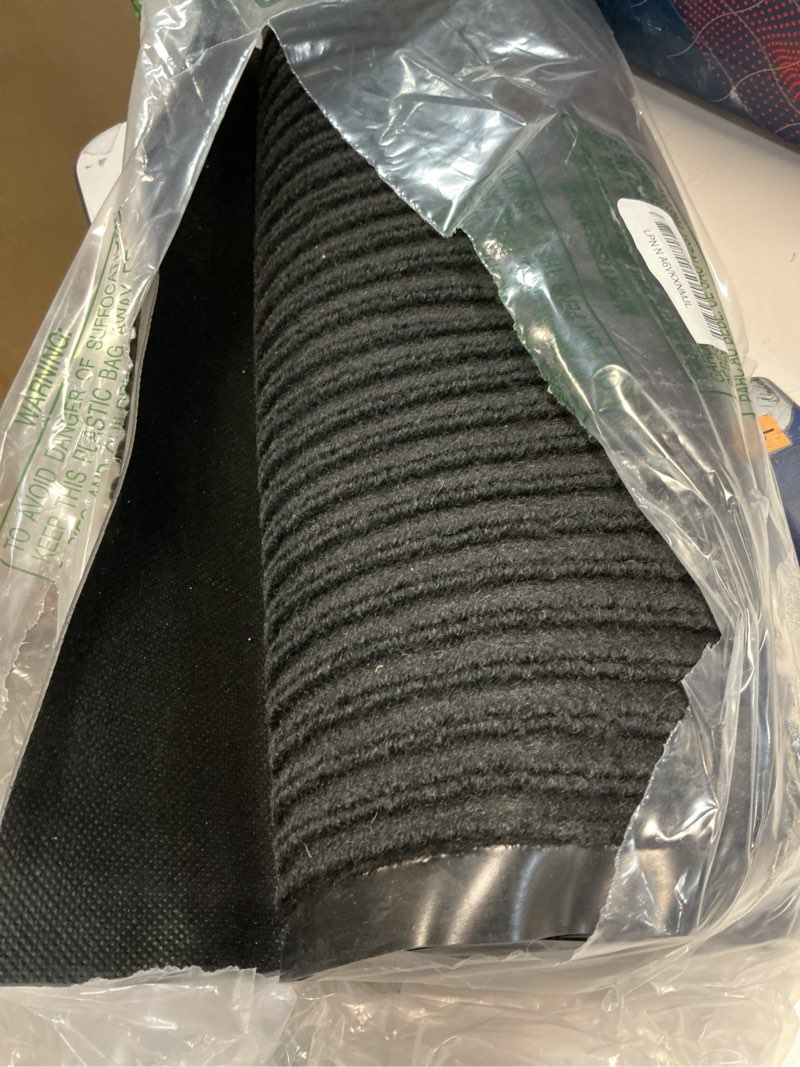 Condition photo showing Good Condition for OLANLY Front Door Mat Indoor Outdoor Entrance, Waterproof Heavy Duty Doormat, Fade Resistant, Low Profile, Easy Clean Patio Porch Welcome Floor Mats for Entry, 29.5x17, Black 29.5" x 17" Black