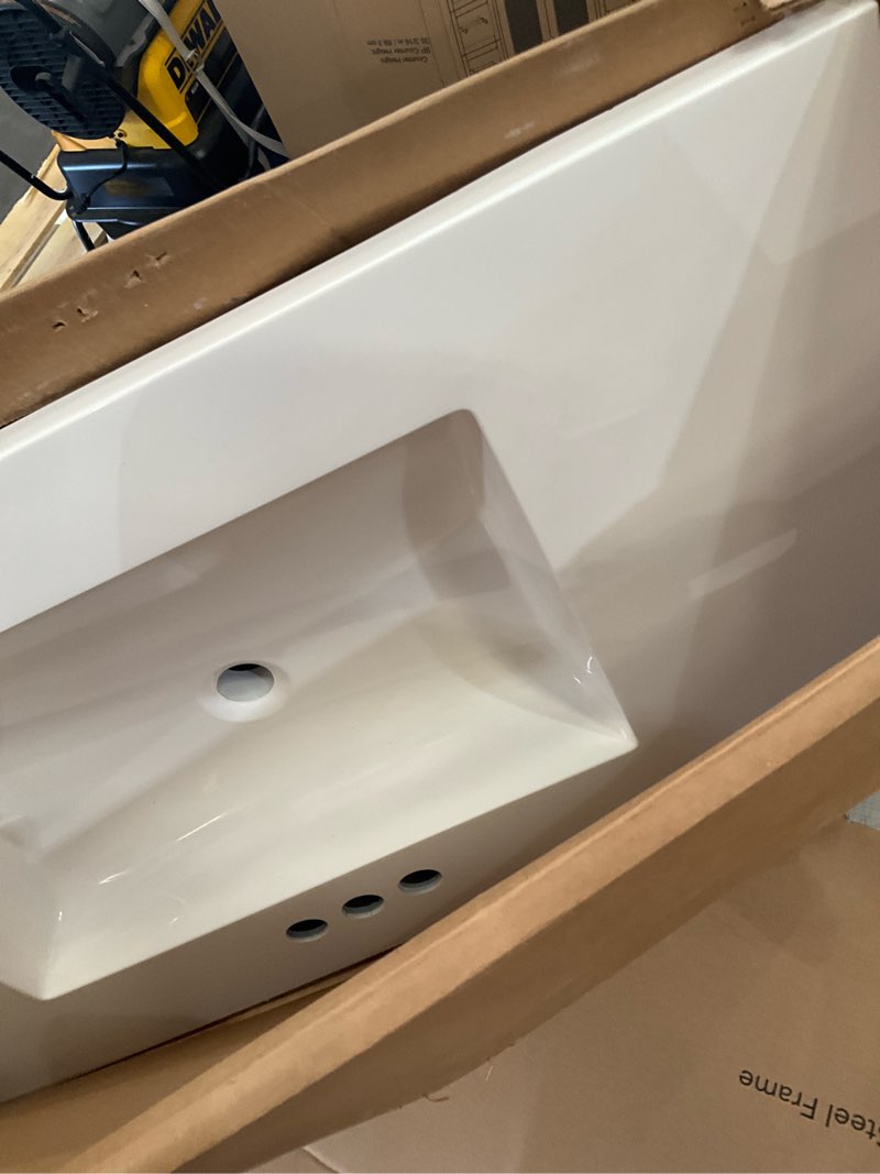 Condition photo showing As Is for  project source 37-in x 22-in white cultured marble single sink 4-in centerset faucet