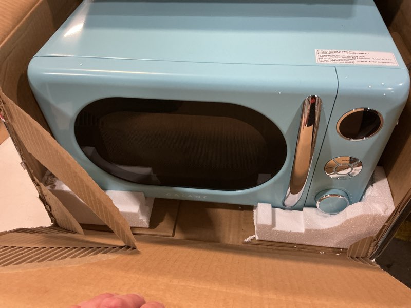 Condition photo showing New/Like New for galanz glcmka07ber-07 retro microwave oven, led lighting, pull handle design, child lock, bebop blue, 0.7 cu ft blue .7 cu ft classic microwave oven