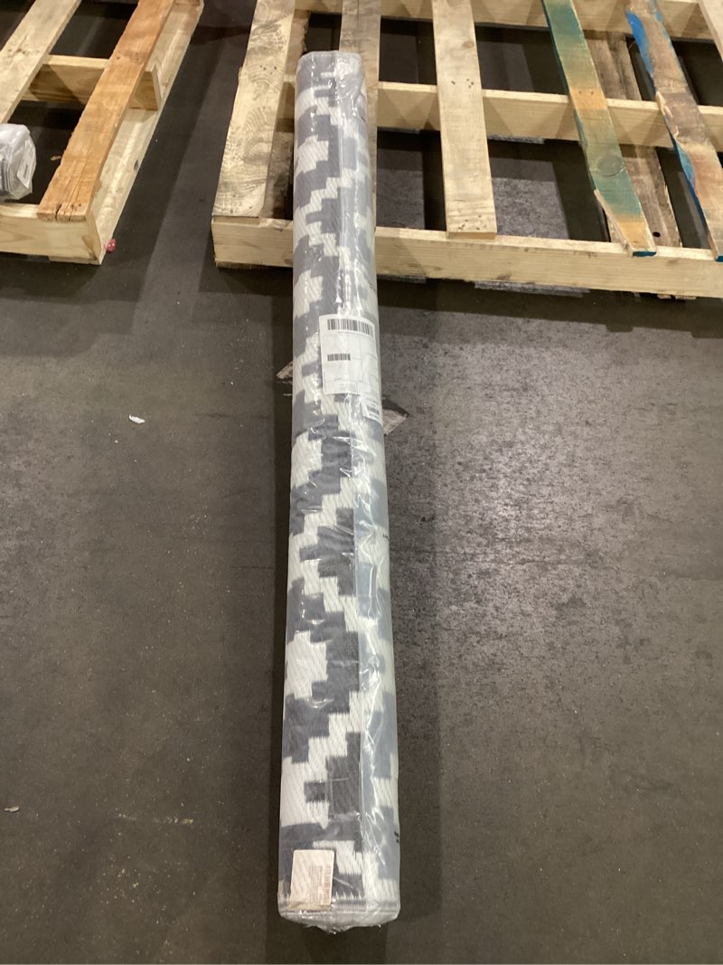 Condition photo showing New/Like New for Rugshop Maui Contemporary Geometric Reversible Crease-Free Waterproof Premium Recycled Plastic Outdoor Rugs for Patio,Backyard,RV,Deck,Picnic,Trailer,Beach,Camping Black 5' x 7' 7' x 5' (Rectangular) Black