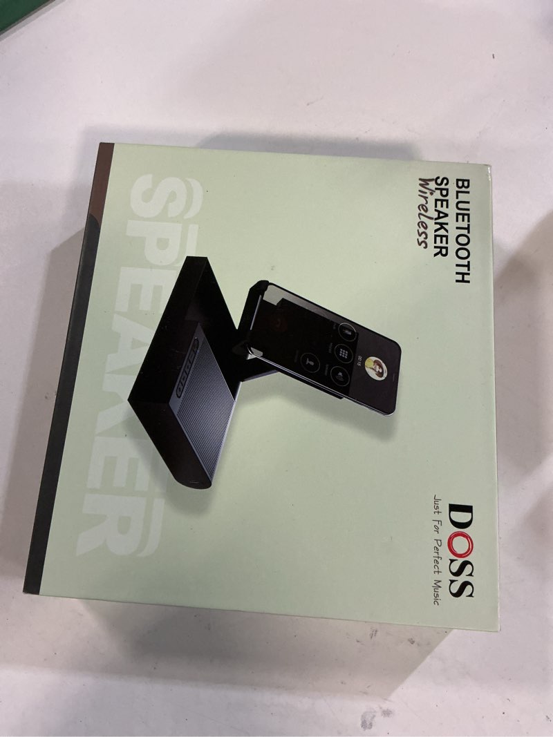 Condition photo showing New/Like New for DOSS Cell Phone Stand with Bluetooth Speaker, 15W Wireless Charger and Anti-Slip Base,4-in-1 Function, 8H Playtime, Hands-Free, Adjustable Holder, Compatible with Tablet