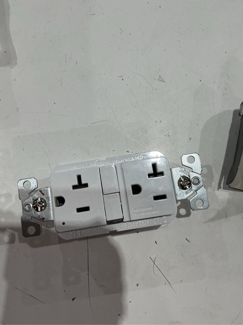 Condition photo showing As Is for eaton 20-amp 125-volt gfci residential decorator outlet, white