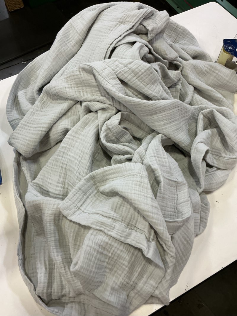 Condition photo showing As Is for organic cotton gauze blanket king sand