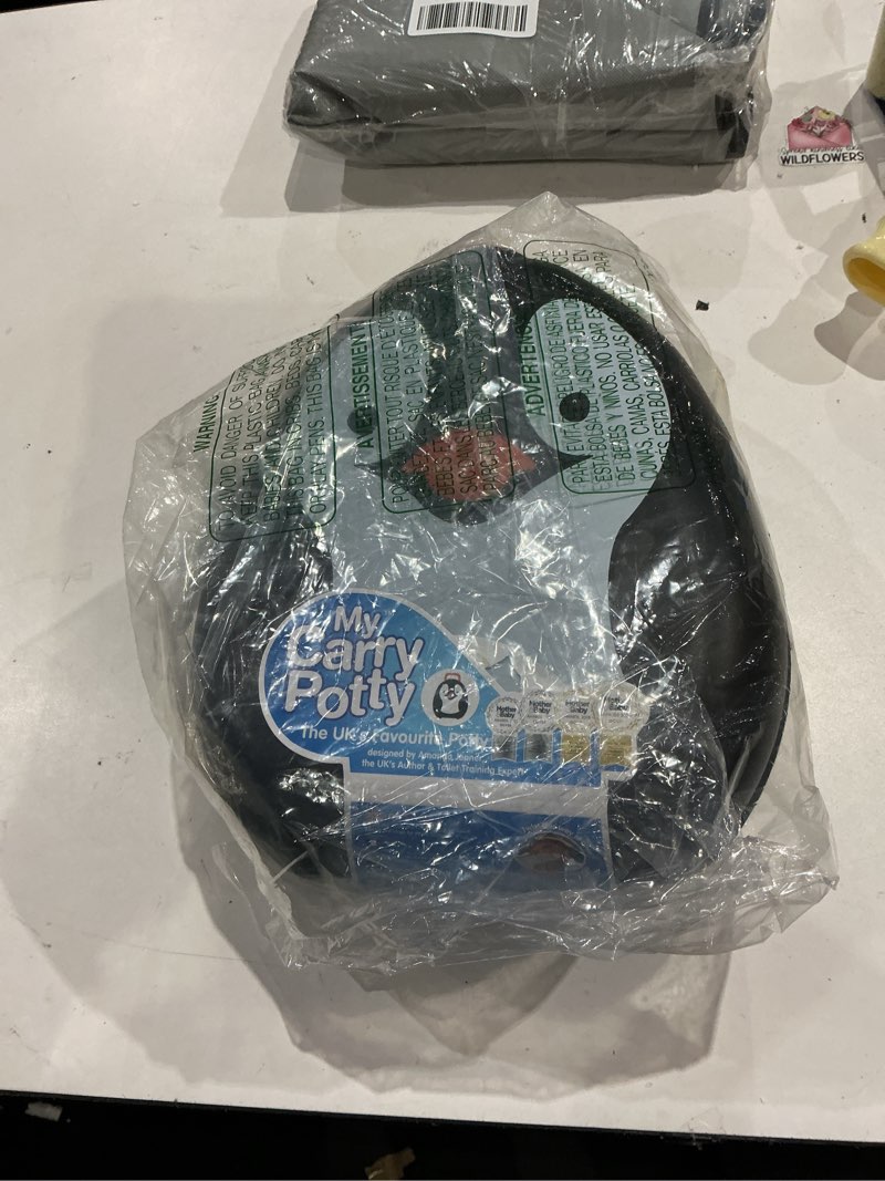 Condition photo showing Good Condition for my carry potty - penguin travel potty, award-winning portable toddler toilet seat for kids to take everywhere