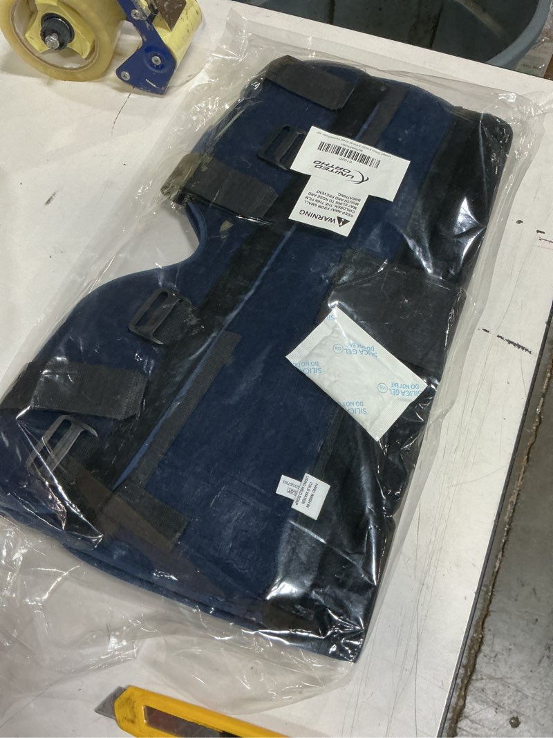 Condition photo showing New/Like New for United Ortho 61020 3-Panel Knee Immobilizer, 20" Navy 20" Immobilizer