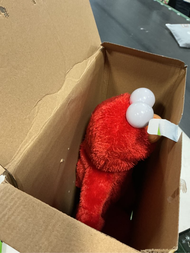 Condition photo showing Good Condition for sesame street hokey pokey elmo 14” interactive plush toy, sings, dances & plays music, bilingual stuffed animal for pretend play, soft & huggable, ages 18 months and up by just play