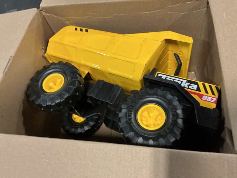 Condition photo showing As Is for Tonka Steel Classics Mighty Dump Truck - Made with Steel & Sturdy Plastic, Yellow Toy Construction Truck, Boys and Girls, Kids, Toddlers, Ages 3+