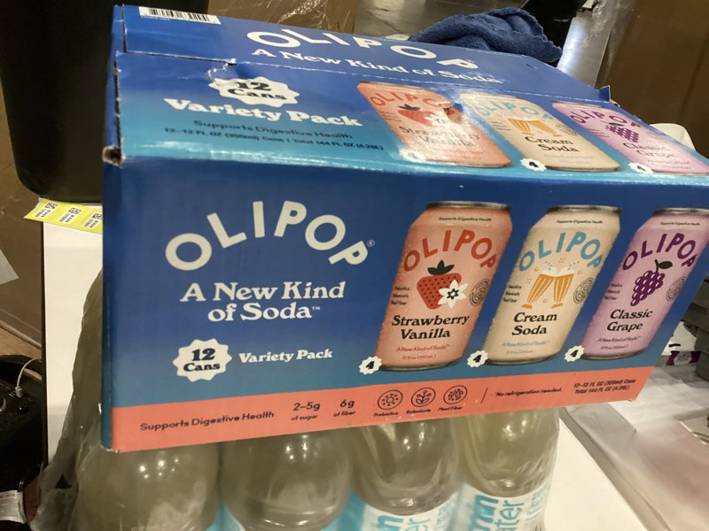 Condition photo showing New/Like New for OLIPOP Prebiotic Soda Pop, 3 Flavor Variety Pack, Prebiotics, Fiber, and Botanicals, Gluten Free, Vegan, GMO Free, 12oz (12-Cans) 3 Flavor Variety Pack 12 Fl Oz (Pack of 12)