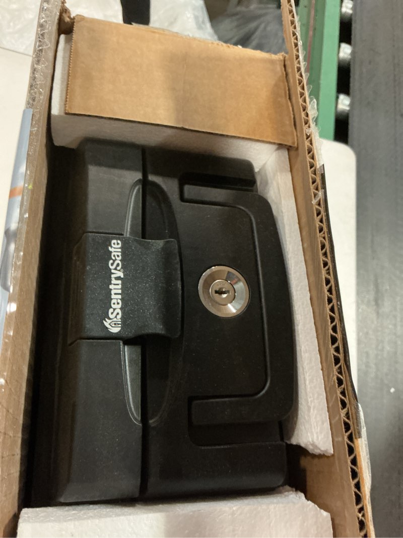 Condition photo showing Good Condition for SentrySafe Fireproof and Waterproof Safe, Black Portable Lock Box with Key Lock and Carrying Handle for Money, Passport, Exterior: 14.3 in W x 13 in D x 6.1 in H, ?H0100
