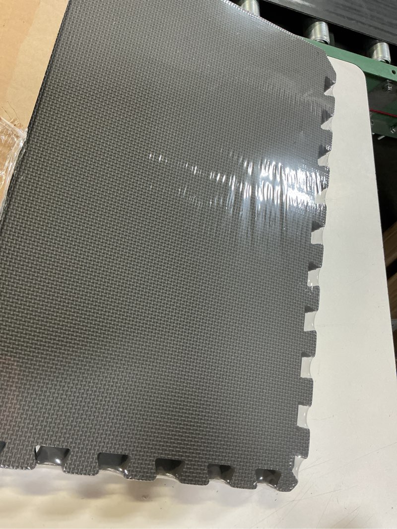 Condition photo showing New/Like New for stalwart foam mat floor tiles, interlocking eva foam padding soft flooring for exercising, yoga, camping, kids, babies, playroom – 6 pack, gray, 24" x 24" x 0.5" grey 24"l x 24"w x 0.5"th
