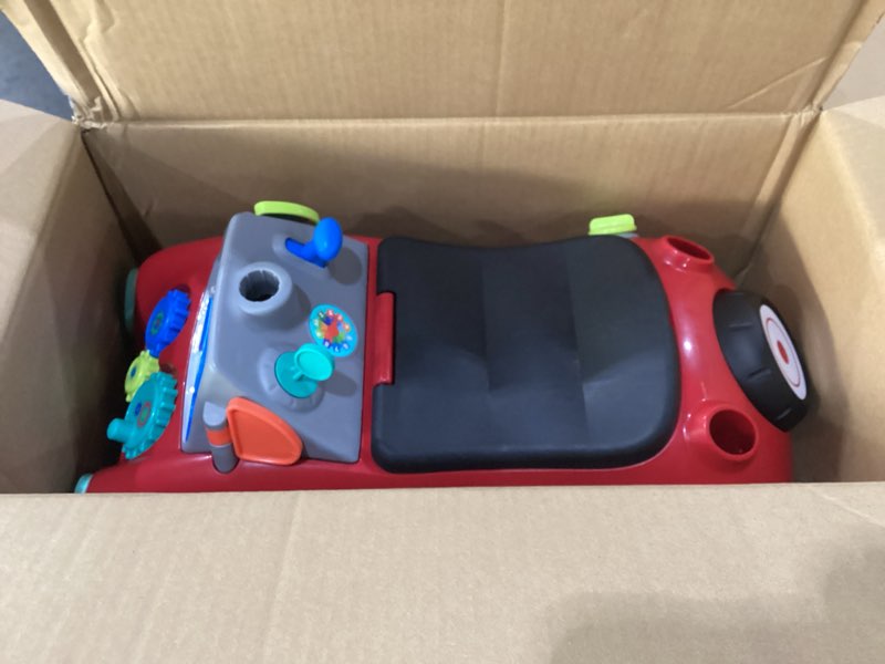 Condition photo showing New/Like New for Radio Flyer Busy Buggy, for Toddlers 1-3, 3-in-1 Push Walker Ride On Car with 17 Sensory Activities, Anti-Tip Feature, Under-Seat Storage, Horn and Gears, 42 lb Capacity, Toddler Ride On Toys Red