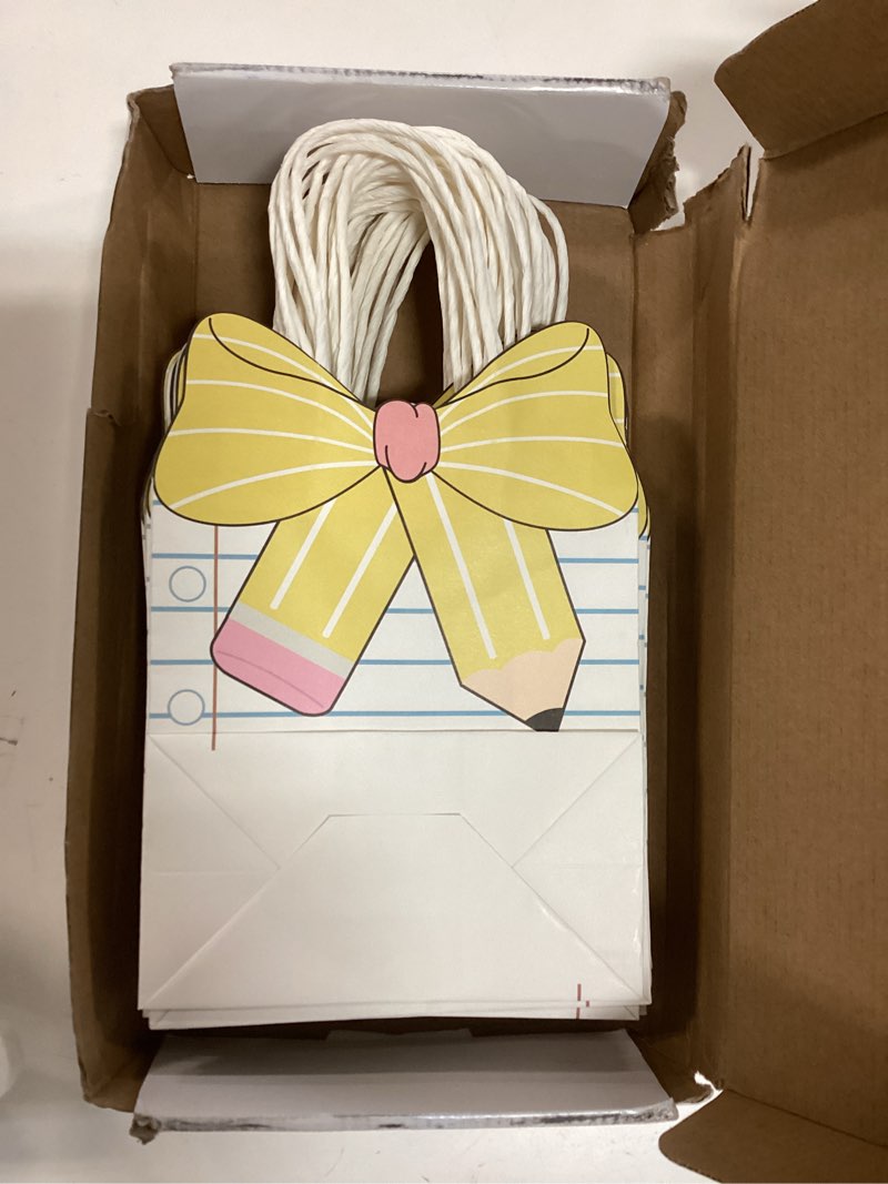 Condition photo showing New/Like New for kolldenn 24 pcs teacher gift bags composition paper bags with handles notebook line teacher appreciation graduation gifts bag for kindergarten preschool end of year party favors (notebook) 24 notebook