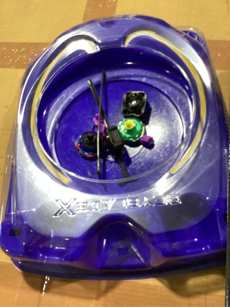 Condition photo showing Good Condition for beyblade x drop attack battle set with beystadium arena, 2 takara tomy tops & launchers, impact drake 9-60lr & hover wyvern 3-85n, battling game toys, ages 8+