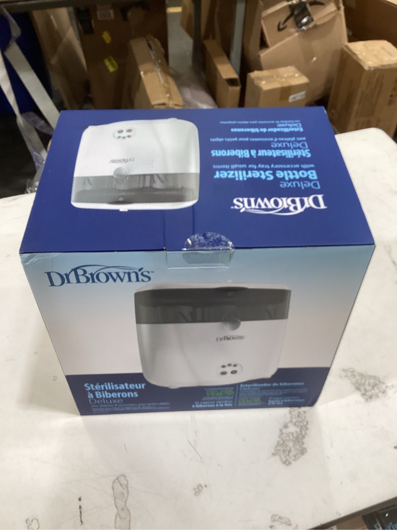 Condition photo showing New/Like New for dr. brown’s deluxe electric sterilizer for baby bottles and other baby essentials