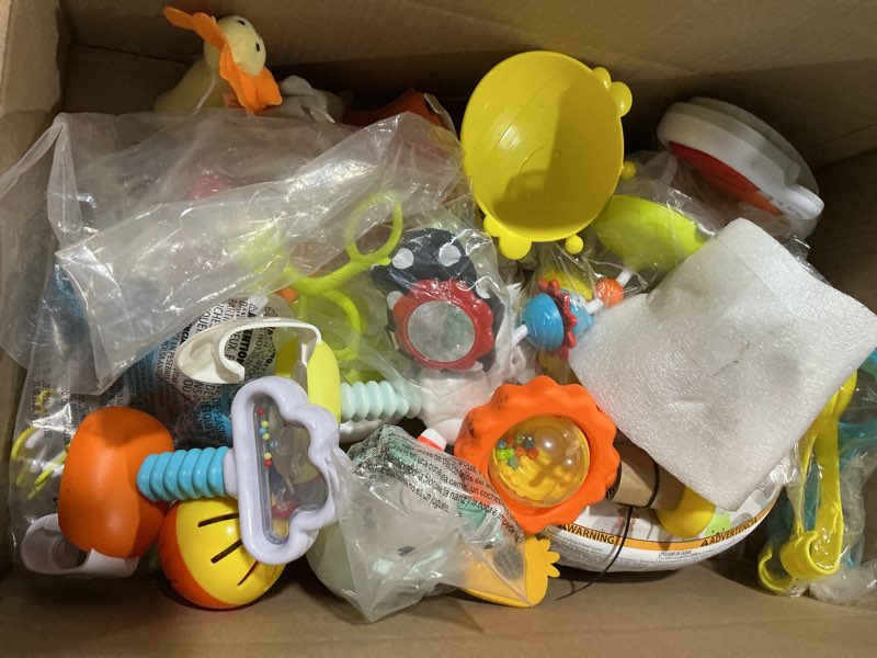 Condition photo showing As Is for Assorted Baby Bouncer Toys & Attachments