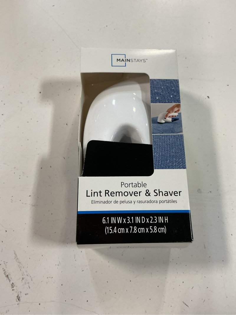 Condition photo showing Good Condition for mainstays portable plastic travel lint remover and shaver  white/blue