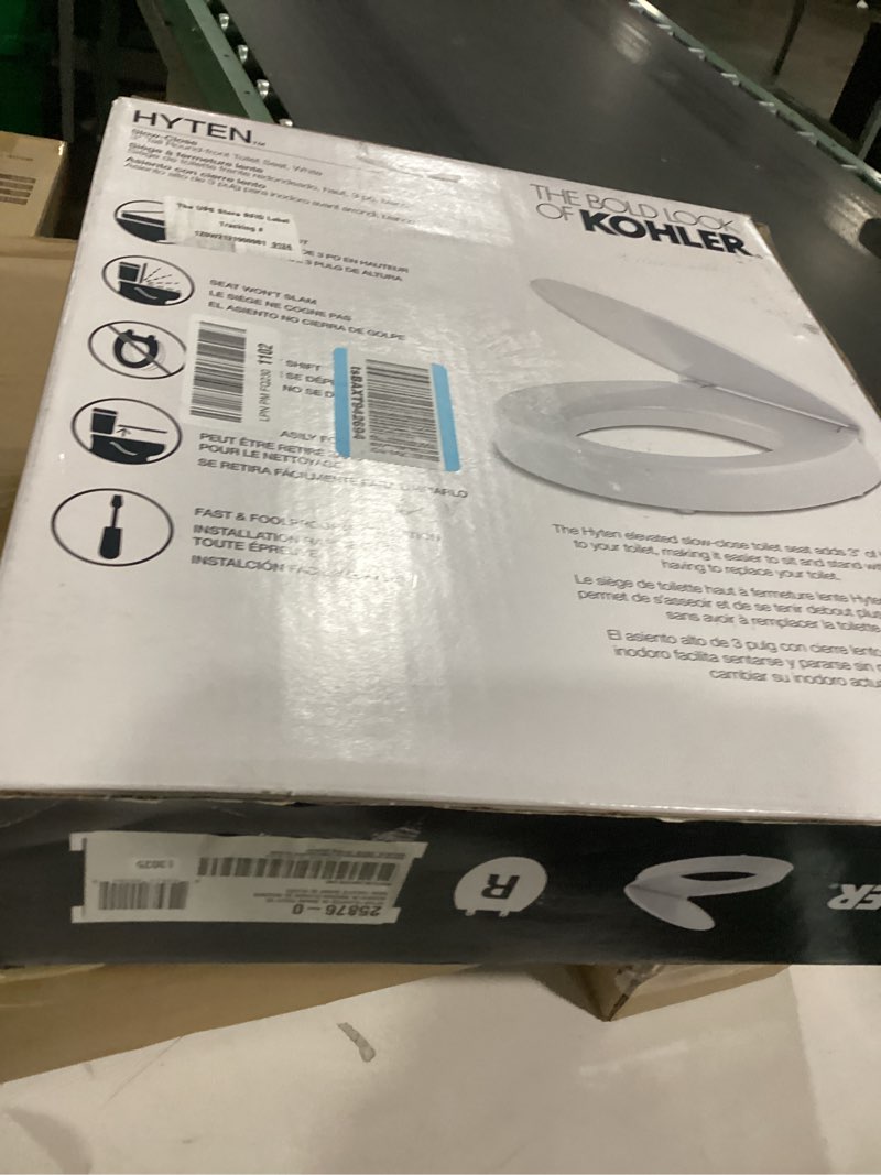 Condition photo showing New/Like New for kohler 25876-0 hyten 3" height, elevated soft close round toilet seat, contoured seat with grip-tight bumpers, quick-attach hardware, white white round