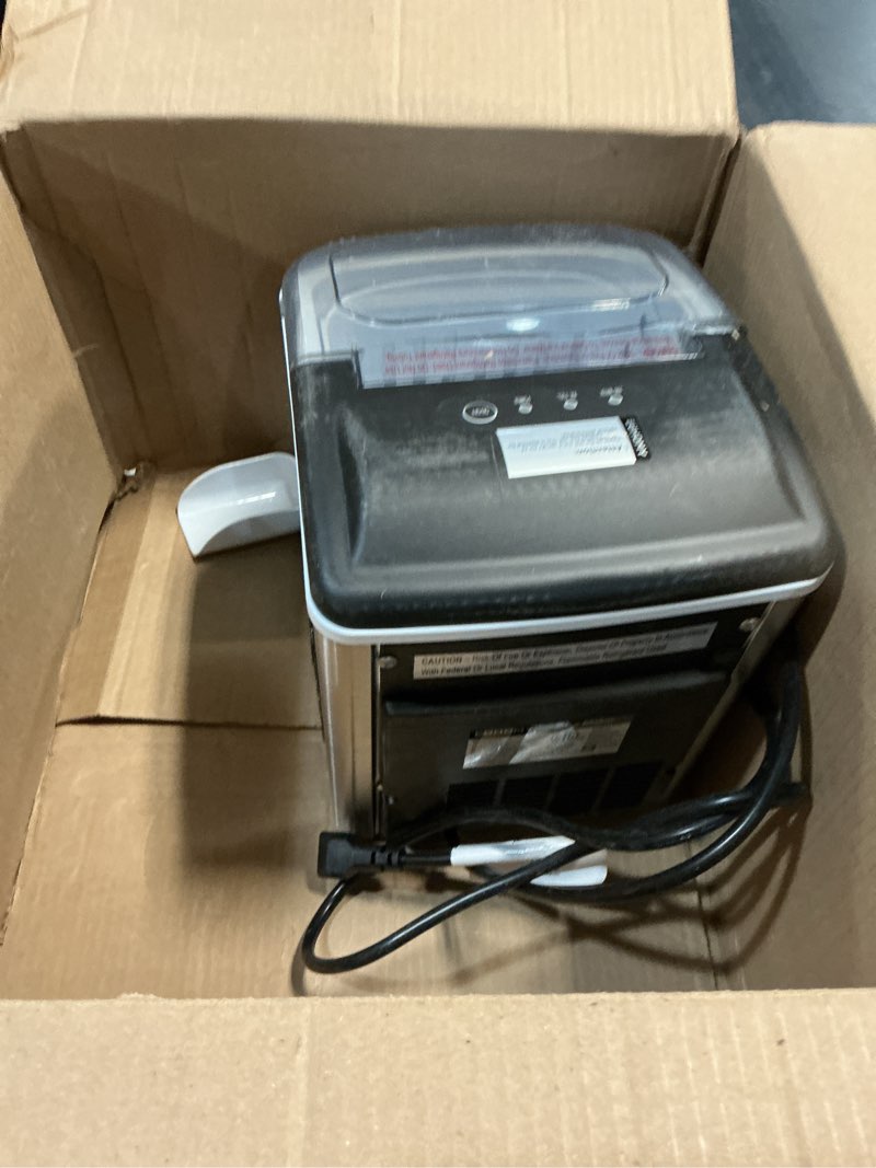 Condition photo showing As Is for EUHOMY Countertop Ice Maker Machine with Handle, 26lbs Per Day, 9 Ice Cubes Ready in 6 Mins, Auto-Cleaning Portable Ice Maker with Basket and Scoop, for Home/Kitchen/Camping/RV (Silver) ICE MACHINE 11.57"D x 11.42"W x 8.74"H Light Grey