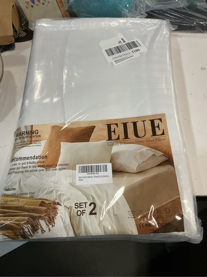Condition photo showing New/Like New for EIUE Hotel Collection Bed Pillows for Sleeping 2 Pack Standard Size?Pillows for Side and Back Sleepers,Super Soft Down Alternative Microfiber Filled Pillows,20 x 26 Inches White Standard (2Pack)