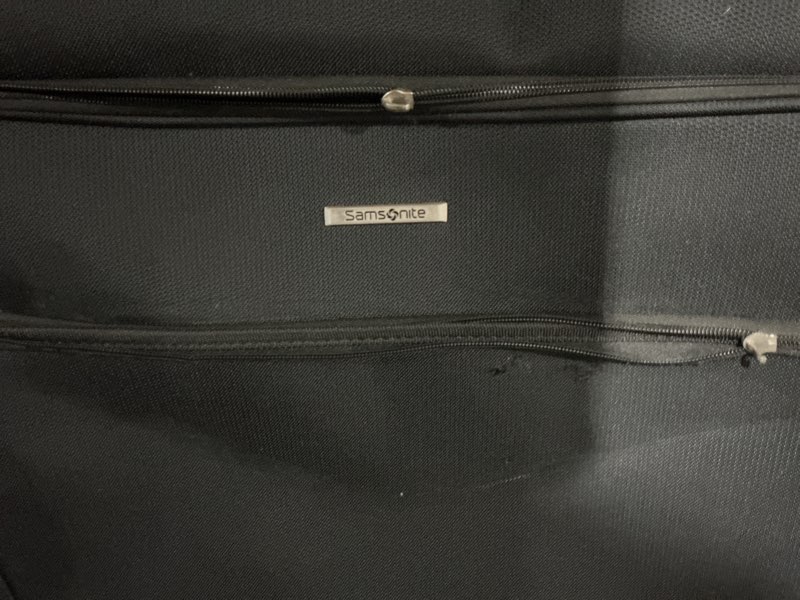 Condition photo showing As Is for ascella x wheeled ultravalet garment bag