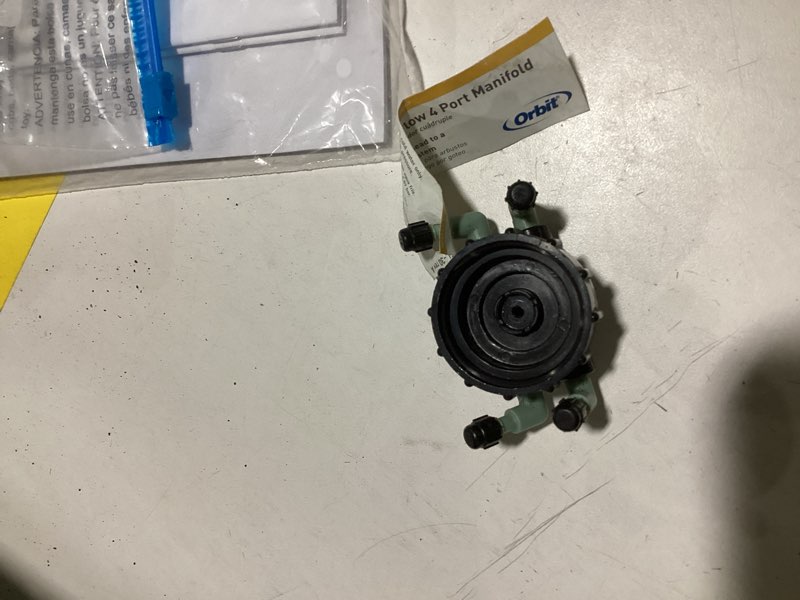 Condition photo showing Good Condition for orbit 4-port npt adjustable flow control irrigation manifold with filter