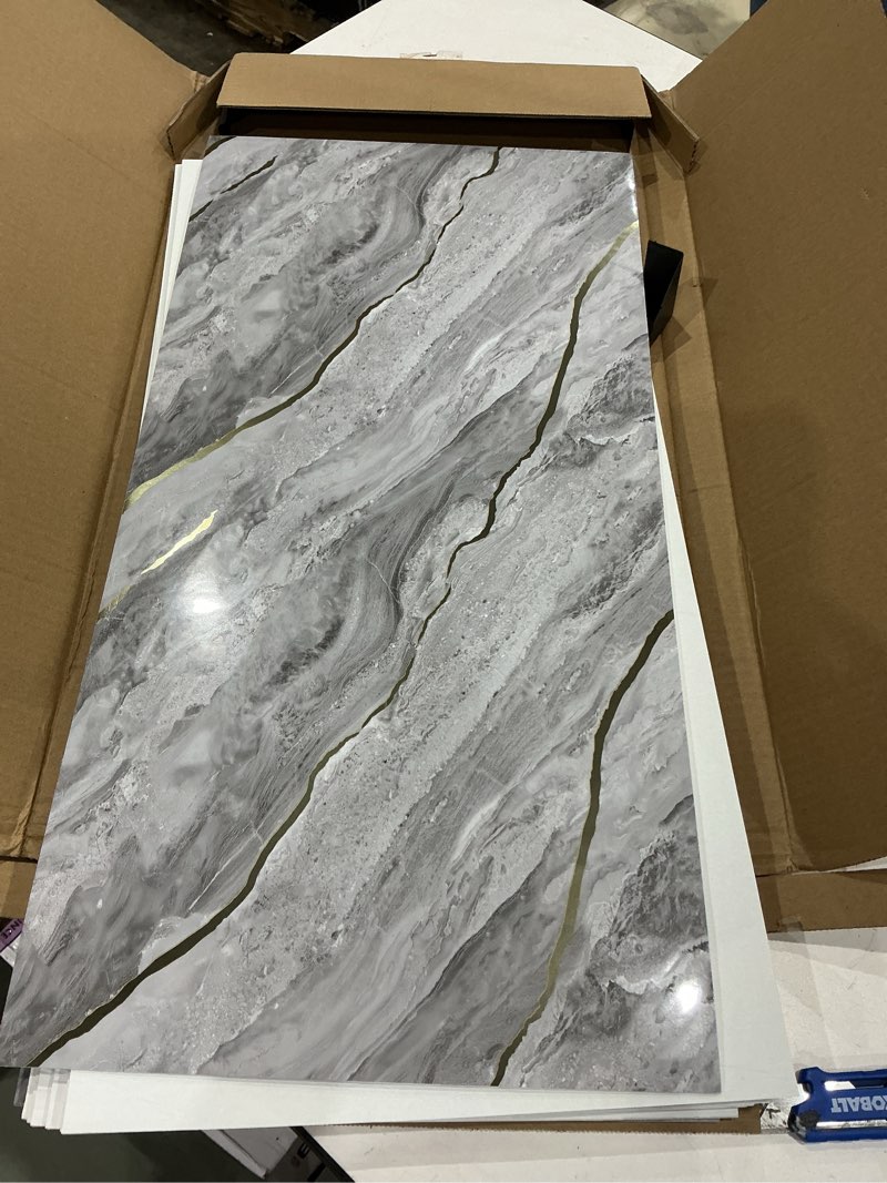 Condition photo showing Good Condition for haimin wall panels peel and stick 10 pieces 23.6x11.8in (19.4 sq. ft. coverage) lightweight backsplash marble look tile (not real marble) ideal for kitchen bathrooms living rooms bedrooms gray gold-06