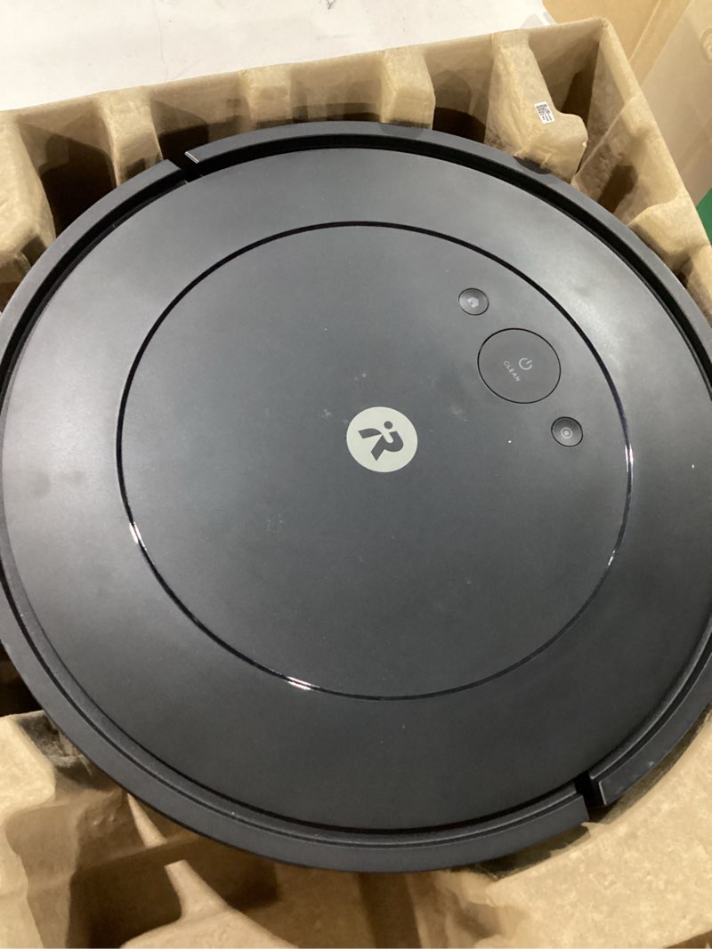Condition photo showing As Is for *missing parts* irobot roomba vac robot vacuum (q0120) - easy to use, power-lifting suction, multi-surface cleaning, smart navigation cleans in neat rows, self-charging, alexa
