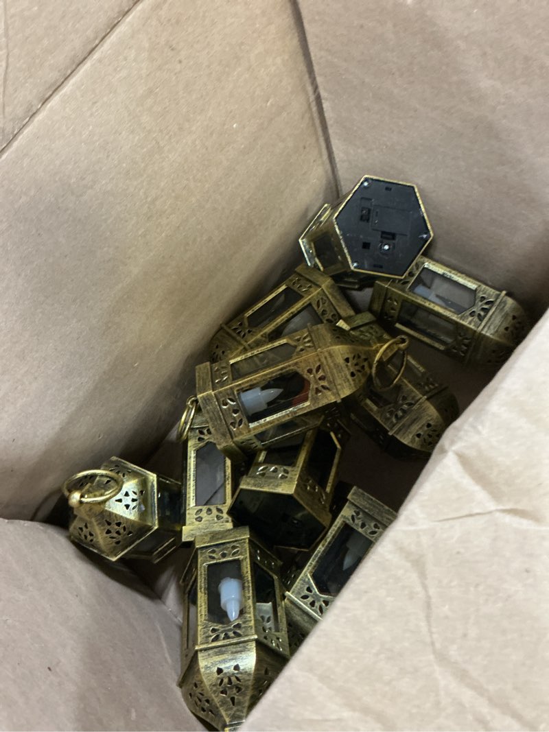 Condition photo showing Good Condition for mini lantern with flickering led candles set of 10, hewory gold vintage decorative hanging candle lanterns for halloween, christmas, wedding decorations, party, table centerpiece, battery included 10pcs gold