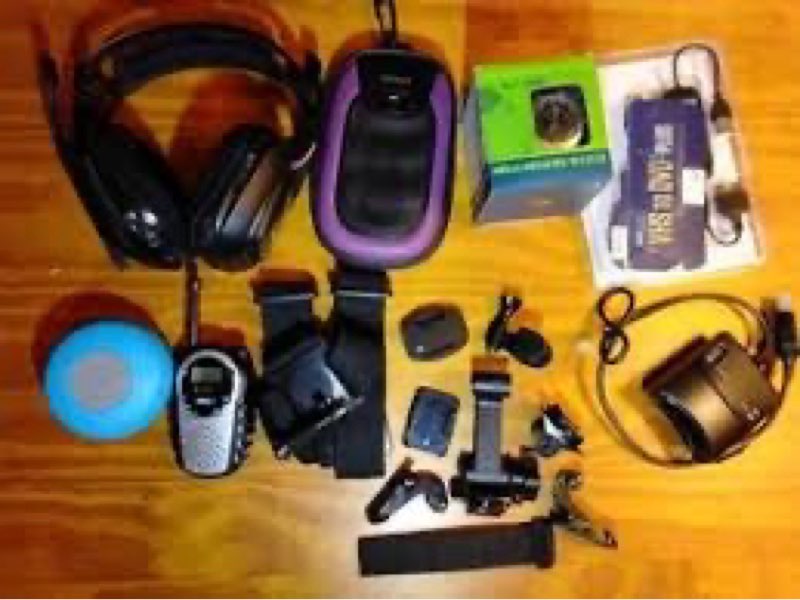 assortment of loose electronics, headphones, etc.