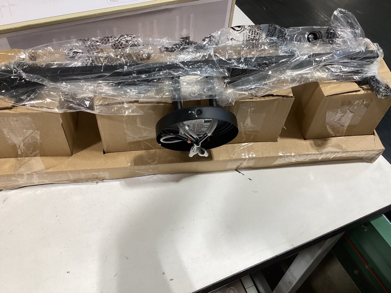 Condition photo showing As Is for allen + roth emeryson 24.5-in 4-light matte black transitional vanity light