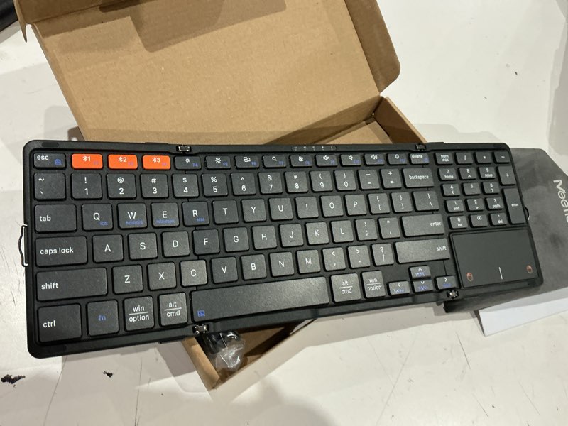 Condition photo showing Good Condition for meetion bluetooth foldable keyboard with touchpad & numeric keypad, wireless folding keyboard, portable multi-device keyboards, full-size travel business design for windows mac ios android ipad tablet black