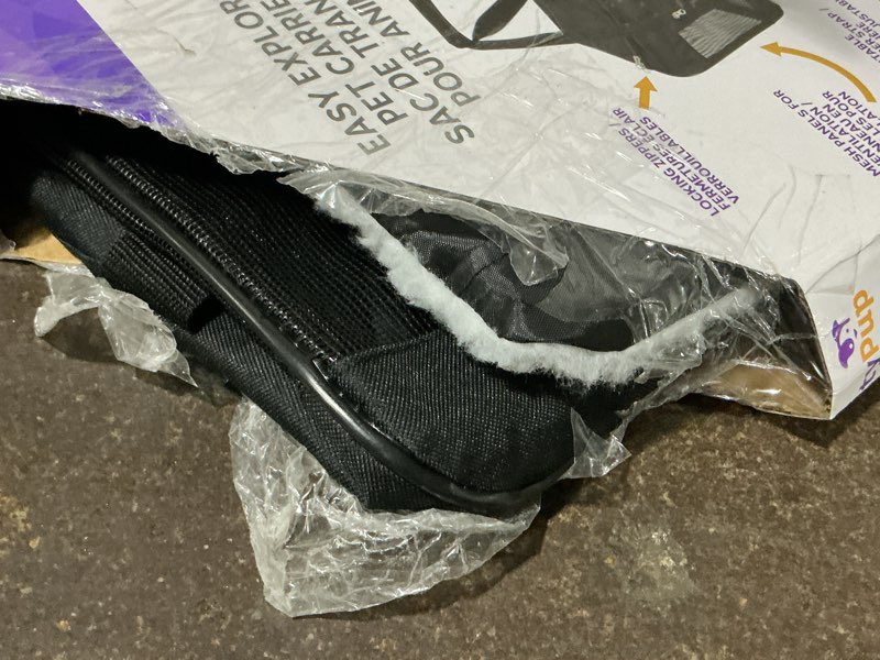 Condition photo showing As Is for trustypup easy explorer medium guaranteed on-board travel pet carrier, black, 16 lb limit