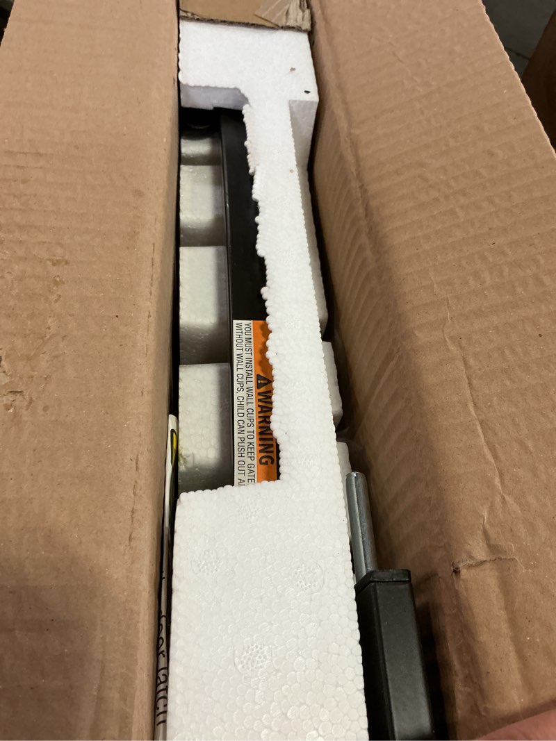 Condition photo showing As Is for Regalo Safety 36" Extra Tall Arch Baby Gate for Doorways & Bottom of Stairs, Pressure Mount Safety Gate with Door for Babies, Toddlers & Pets, Tested & Safe, American Designed, Family Owned Black - 30-35"w X 36"h