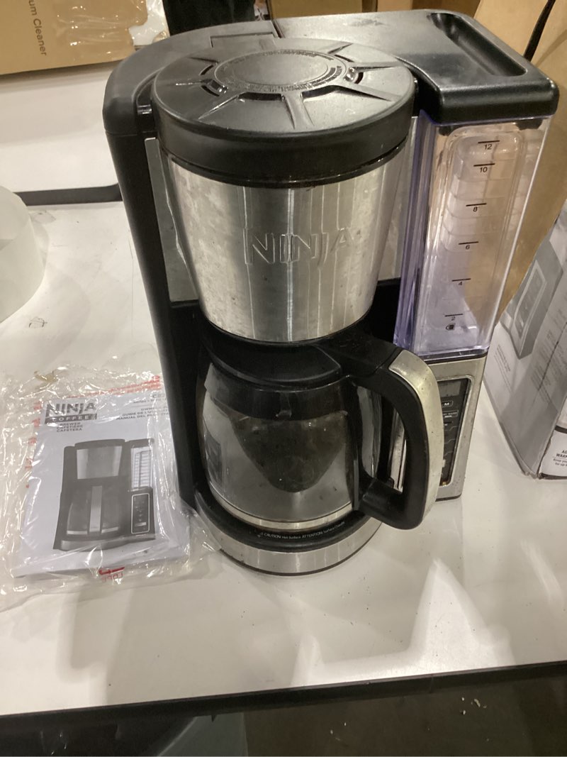 Condition photo showing As Is for not tested**** ninja 12-cup programmable coffee brewer, 2 brew styles, adjustable warm plate, 60oz water reservoir, delay brew - black/stainless steel