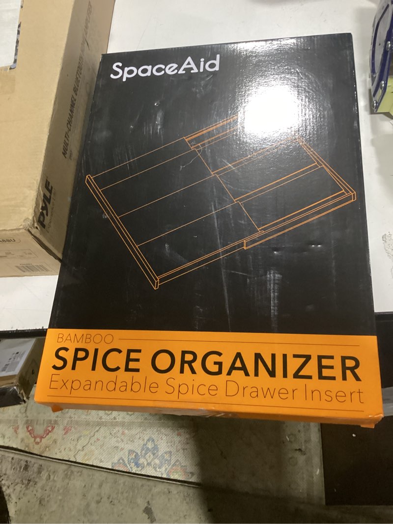 Condition photo showing New/Like New for spaceaid bamboo black spice drawer organizer, (need 3" deep drawer) expandable 4 tier spices rack for cabinet, kitchen seasoning storage insert (jars not included, from 12" to 23" wide) 12" to 23" wide black